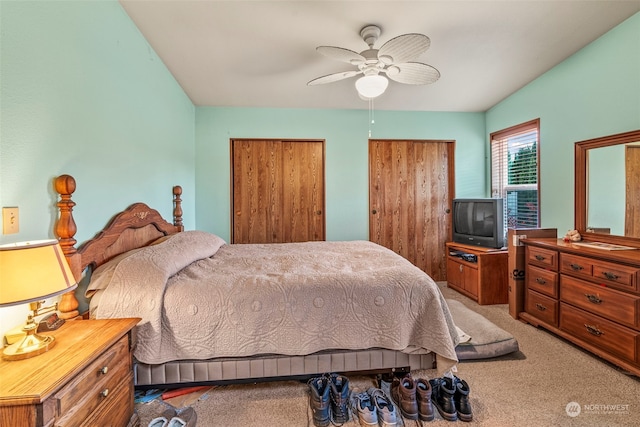 carpeted bedroom with ceiling fan