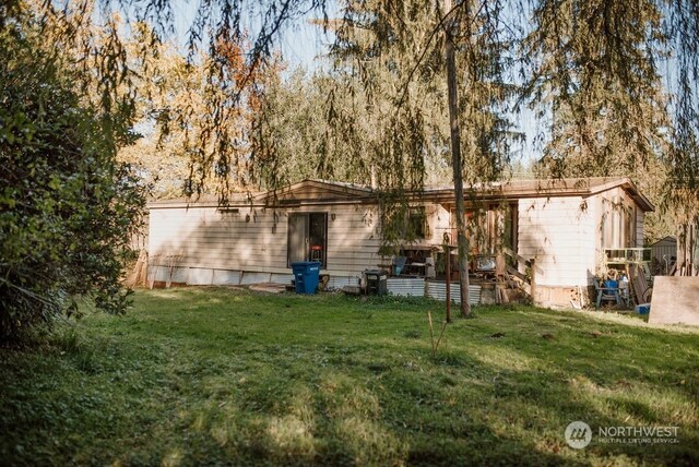 19325 Jordan Rd, Arlington, WA 98223 - back of property featuring a yard