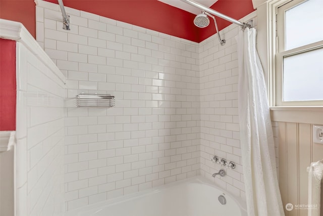 bathroom with shower / bathtub combination with curtain