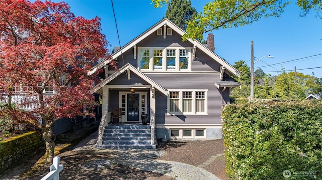 view of front of house with a chimney
