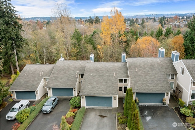 bird's eye view featuring a forest view