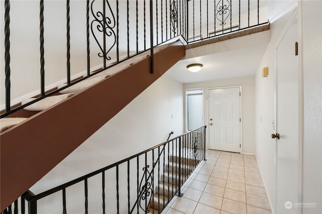 hallway featuring tile patterned floors