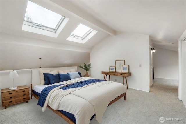 bedroom with vaulted ceiling with beams and light colored carpet