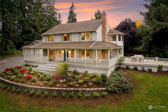 farmhouse inspired home with a porch