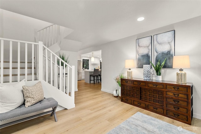 living area with wood-type flooring