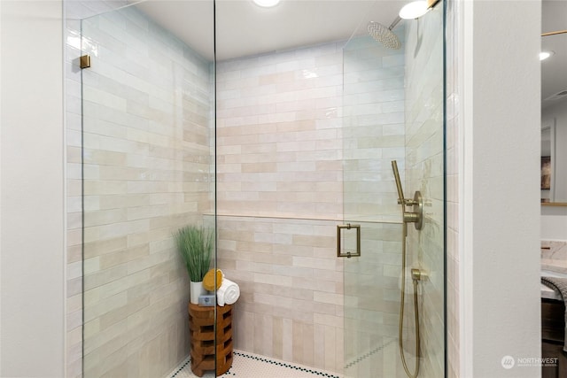 bathroom featuring an enclosed shower