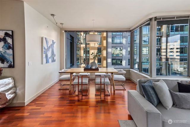 dining area with wood-type flooring