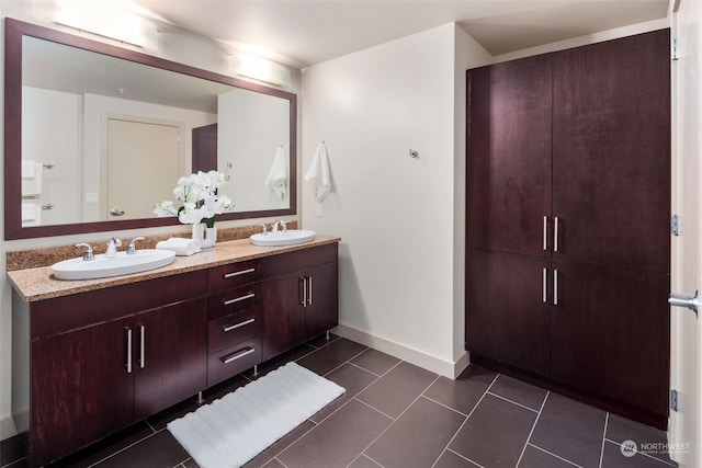 bathroom featuring vanity and tile patterned floors