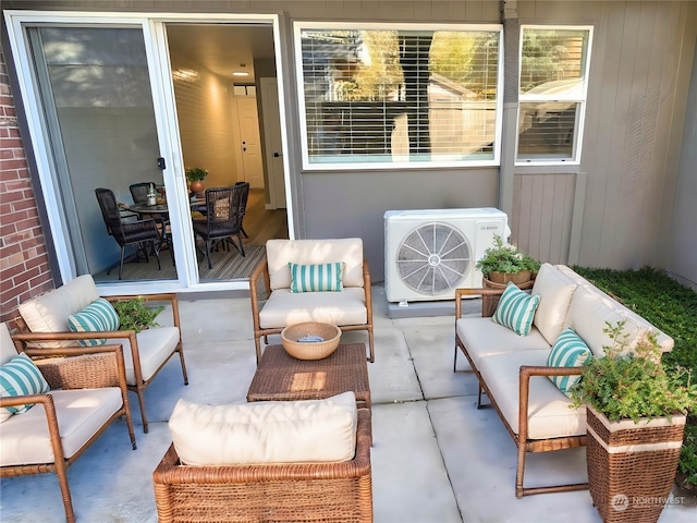 view of patio / terrace with outdoor lounge area and ac unit