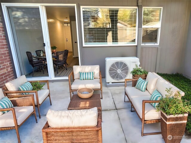 view of patio / terrace with outdoor lounge area and ac unit