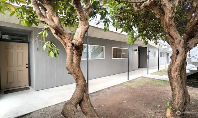 property entrance with a patio