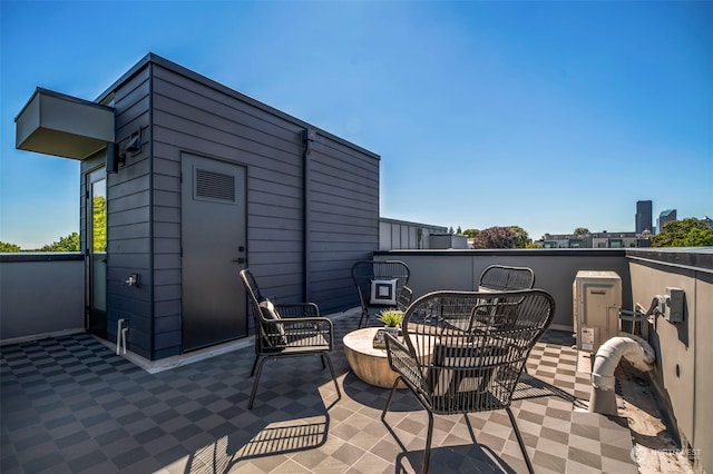 view of patio featuring a fire pit