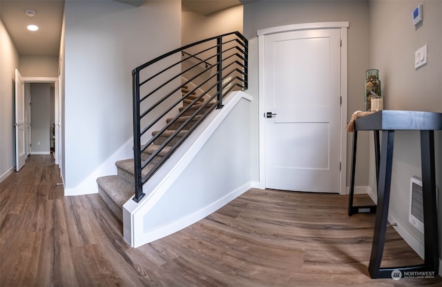 entrance foyer featuring wood-type flooring