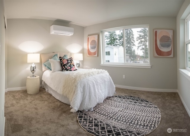 bedroom featuring an AC wall unit and carpet flooring