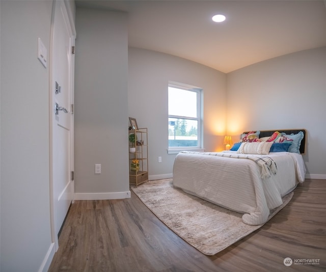 bedroom featuring hardwood / wood-style flooring