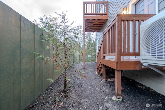 view of side of property featuring ac unit