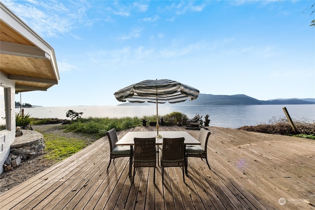 deck featuring a water and mountain view