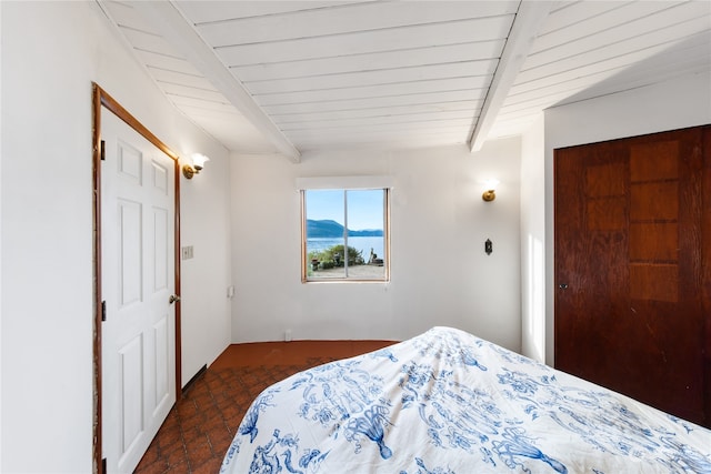 bedroom with beamed ceiling