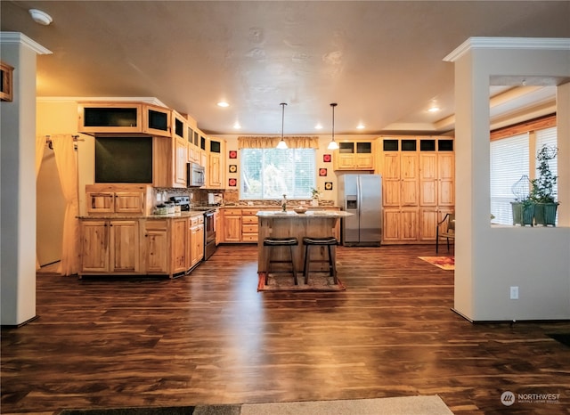 kitchen with stainless steel appliances, a kitchen island, backsplash, hanging light fixtures, and dark wood-type flooring