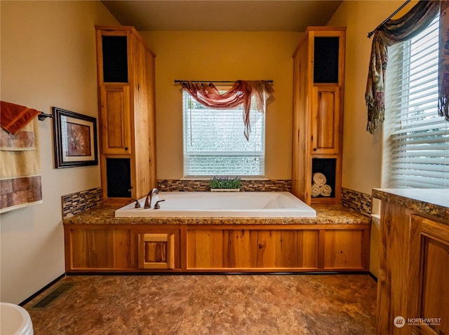 bathroom with a bathing tub