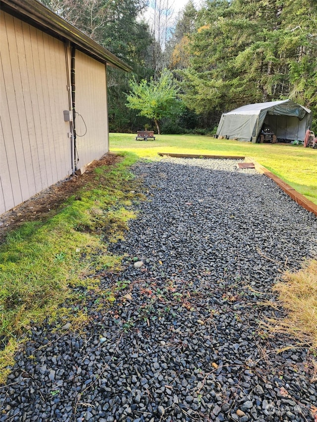 view of yard featuring a carport