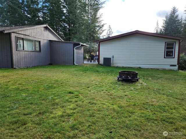 view of yard featuring central AC