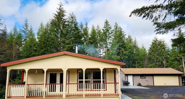 4120 W Shelton-Matlock Rd, Shelton, WA 98584 - view of front of house featuring a porch and a garage