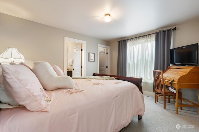 bedroom featuring carpet floors and baseboards