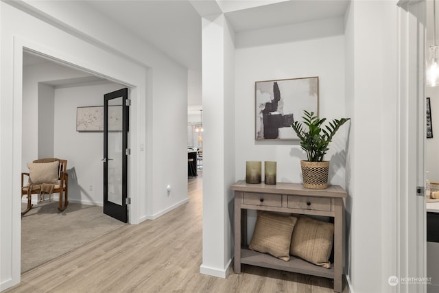 hall featuring light hardwood / wood-style floors