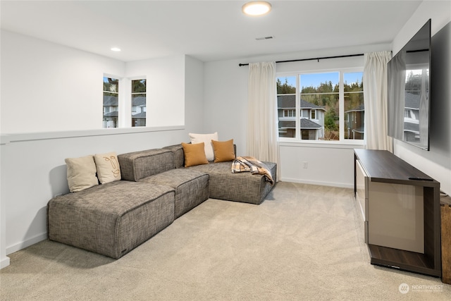 living room with light colored carpet