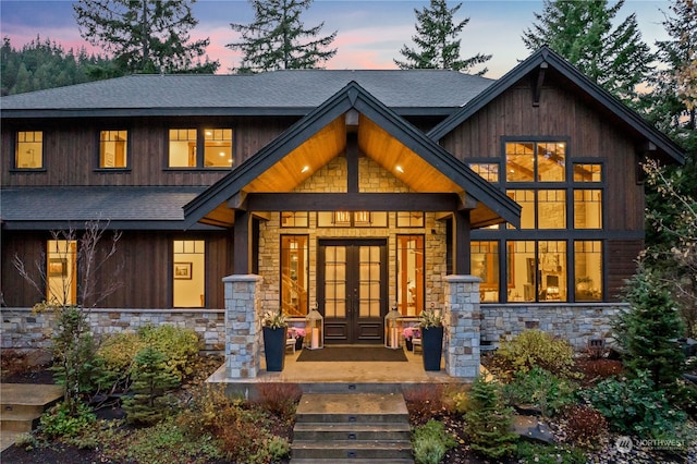 view of front of house featuring french doors and a porch