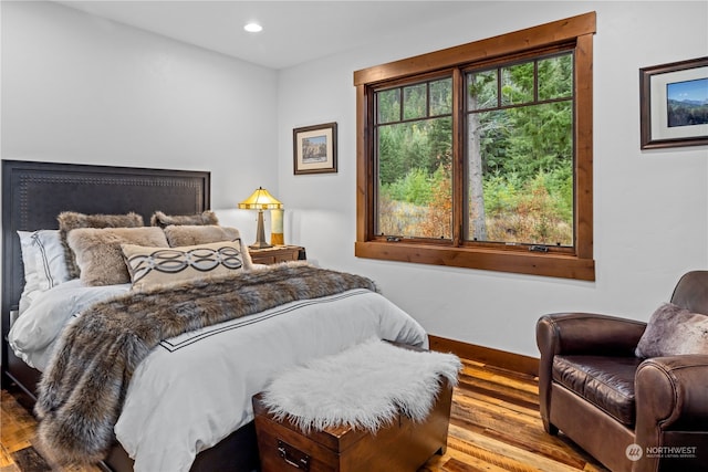 bedroom featuring light hardwood / wood-style flooring