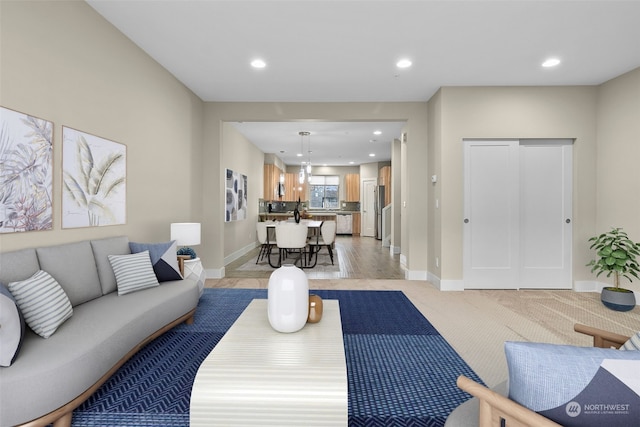 living room with light hardwood / wood-style floors