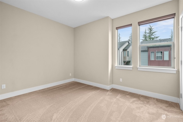 view of carpeted spare room