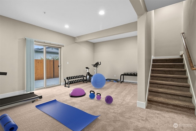 workout area with light colored carpet