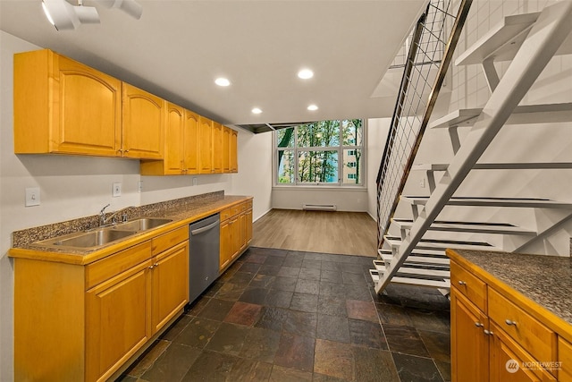 1000 Union St Unit 205, Seattle, WA 98101 - kitchen with stainless steel dishwasher, recessed lighting, dark countertops, a baseboard heating unit, and stone tile floors
