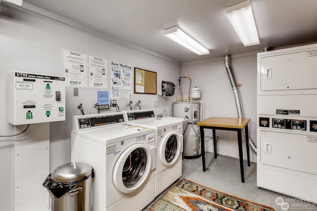 1000 Union St Unit 205, Seattle, WA 98101 - shared laundry room featuring stacked washing machine and dryer, washer and clothes dryer, and water heater
