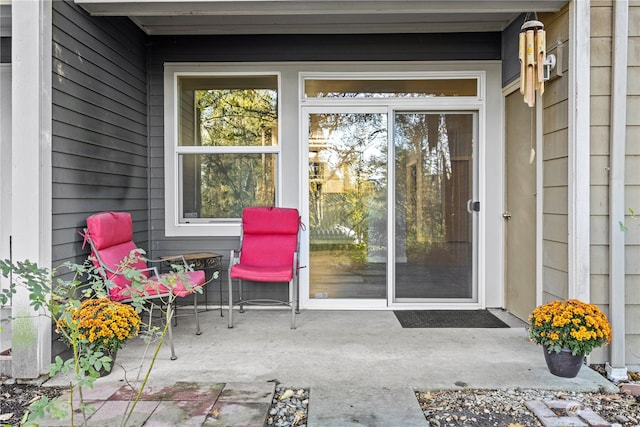 property entrance featuring a patio