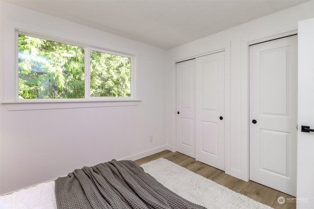 bedroom featuring light hardwood / wood-style floors