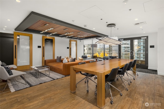 rec room with wood-type flooring