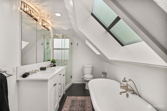 full bathroom with tile patterned flooring, vanity, toilet, and shower with separate bathtub