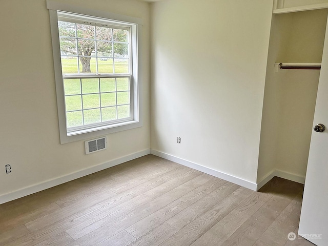 unfurnished bedroom with light hardwood / wood-style flooring