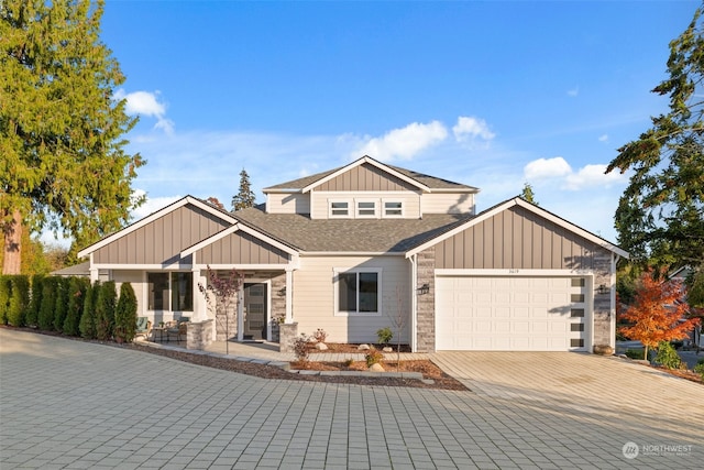 craftsman inspired home with a garage