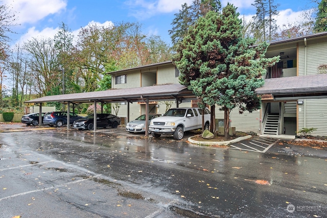 view of parking with a carport