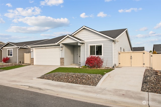 ranch-style house featuring a garage