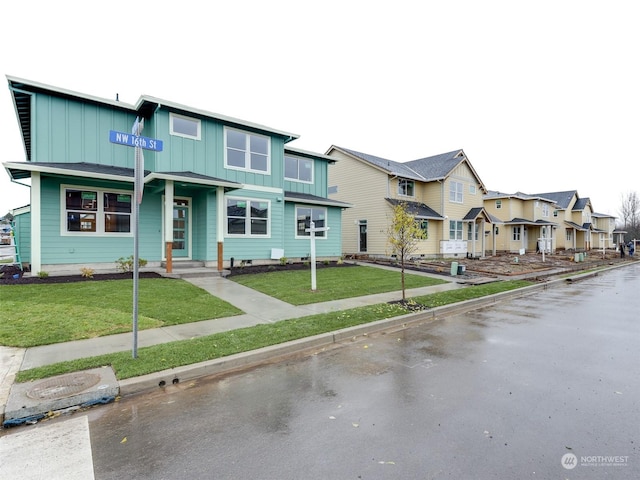 view of front of home with a front lawn