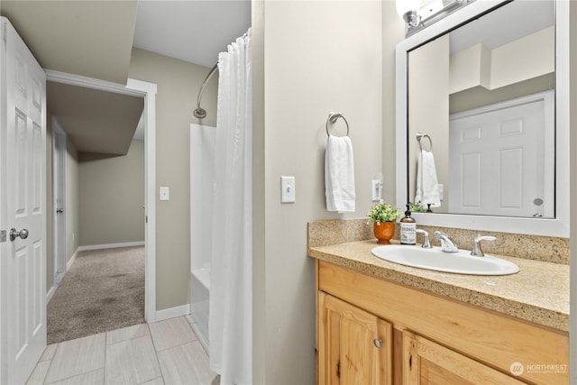 bathroom featuring tile patterned flooring, vanity, and shower / bathtub combination with curtain