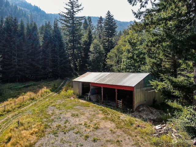 view of outdoor structure featuring a mountain view