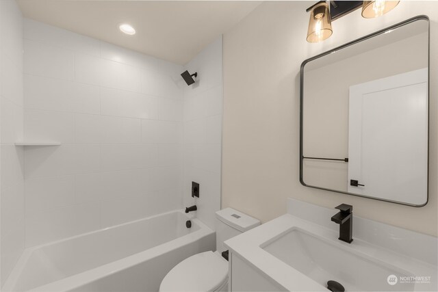 full bathroom with shower / washtub combination, vanity, toilet, and recessed lighting