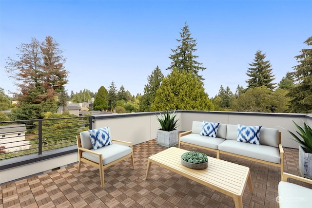 view of patio featuring outdoor lounge area and a balcony